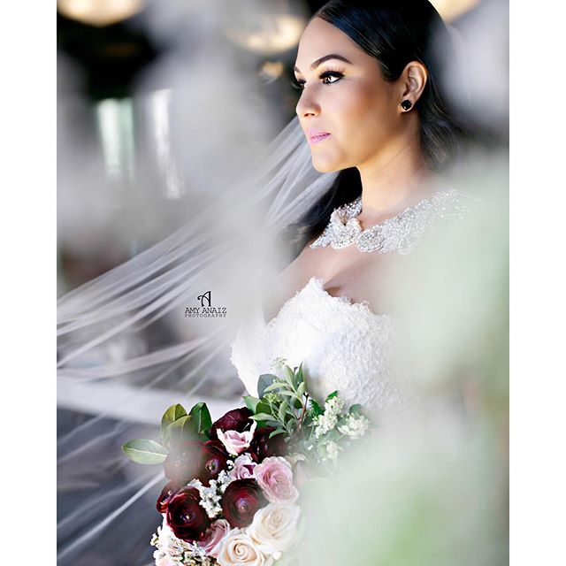 Those silent moments right before the "I do" This editorial is featured in the latest issue of @munaluchibride ?? Hair @nicky_b_on_hair Makeup @beautybylondyn Bolero @jaclynjordanny Veil @angeliquebridal Gown @sarahjassirbridal Styling @vaingloriousbrides Florals @makiniregaldesigns Planning @ellescoutureevents Video @maebfilms Venue @501union