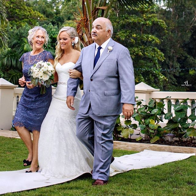 I love when a bride walks with both her parents down the aisle.