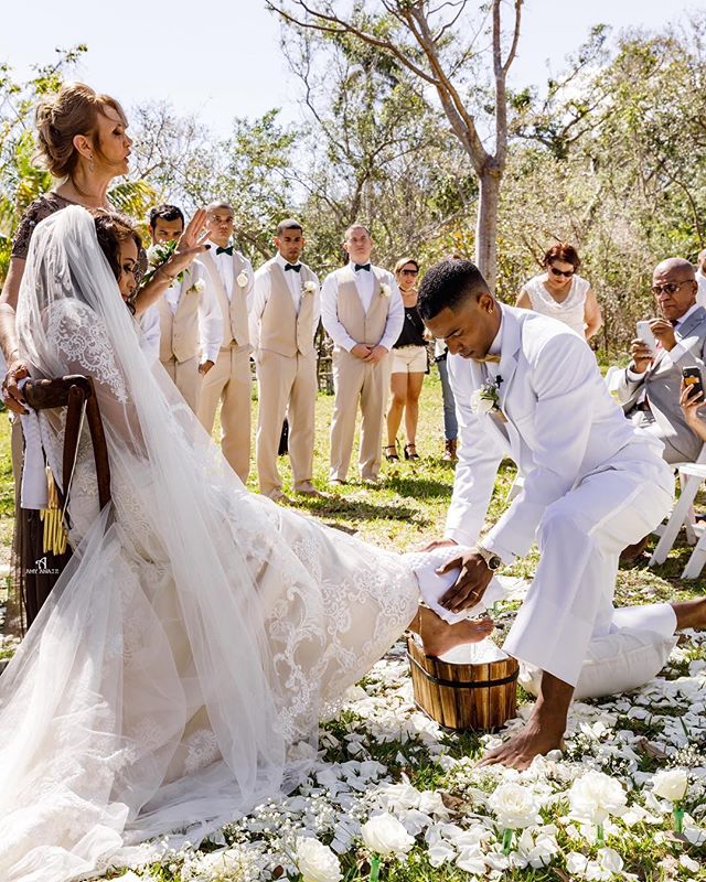 “As our unity ritual we washed each other's feet in the middle of our ceremony. It symbolizes humility and equality and that we can each get down and help one another in time of need.” - Marieli & Albert As seen in the current issue of @theknot